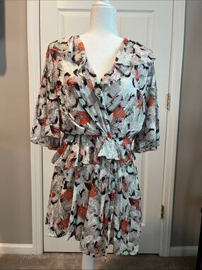 Printed Flutter Sleeve Wrap Dress in White with Orange Accents